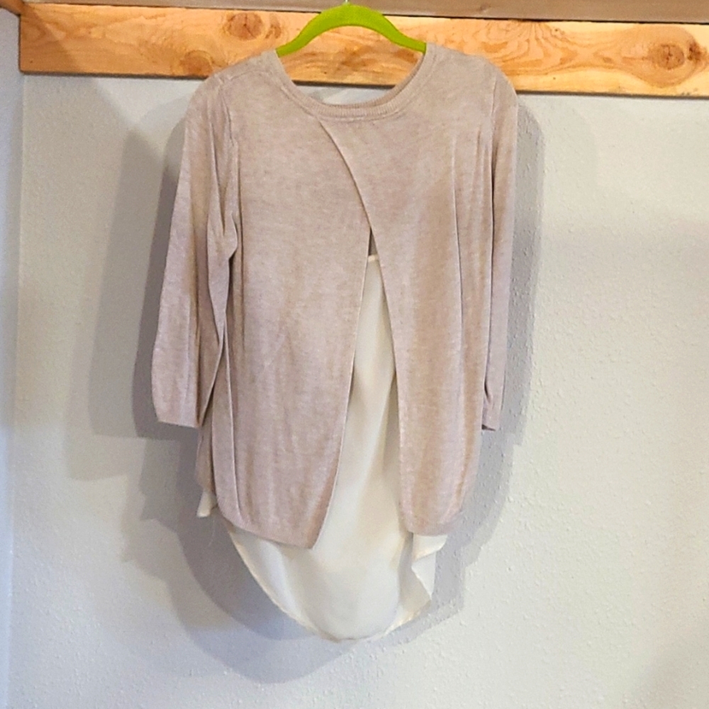 Small cream and white blouse with open back detail